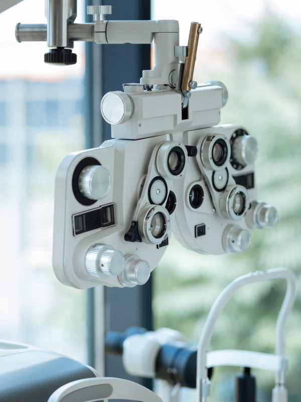 Professional optical device standing in the ophthalmological clinic